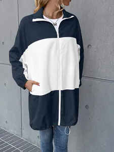 Detail of navy and white color-block waterproof windbreaker with adjustable drawstring hem