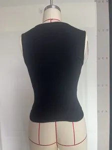 Detailed back view of a slim fit black sleeveless cropped tank top on a mannequin