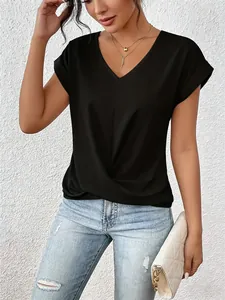 Close-up detail of women's black V-neck t-shirt with a stylish twist hem design.