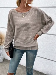 Close-up detail of khaki ribbed long sleeve pullover showing knit texture and round neck