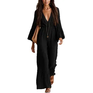 Elegant bohemian black long sleeve V-neck jumpsuit with elastic waist for women