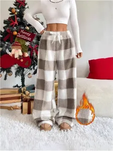 Cozy plaid wide-leg lounge pants with tie waist for winter holiday season