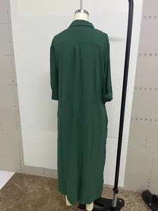 Back view of a retro dark green long-sleeved shirt dress with loose casual fit for women