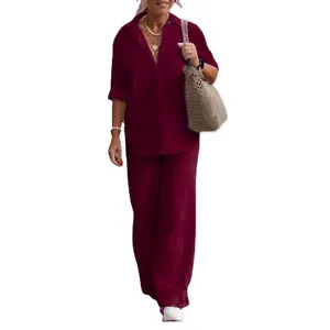Elegant burgundy two-piece set with lapel shirt and wide-leg trousers for autumn