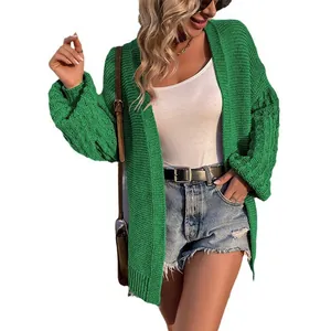 Vibrant green chunky knit cardigan featuring oversized lantern sleeves and an open front.