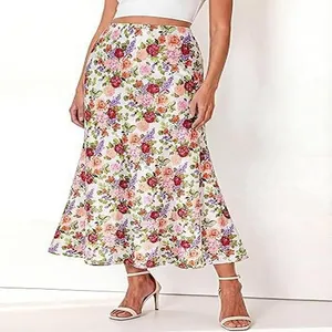Detail of bohemian floral high waist midi skirt for beach vacation style.