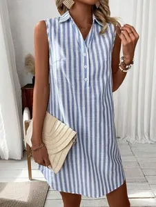 Detail view of the vertical blue and white striped sleeveless V-neck shirt dress.