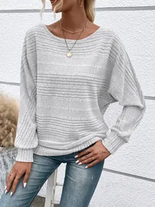 Detailed view showing the soft light grey ribbed fabric texture of a casual batwing sleeve top