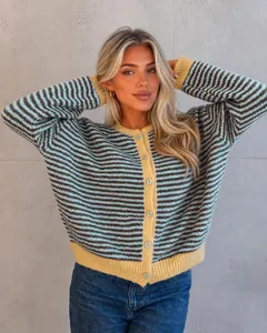 Close-up of a striped knit cardigan with round neck and yellow ribbed trim details