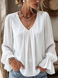 Elegant white V-neck blouse featuring front pleats and stylish ruffled bell sleeve details