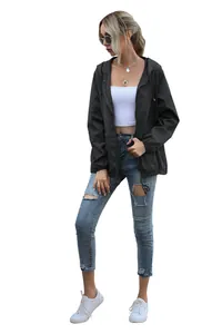 Full view of women's black lightweight waterproof zip-up hooded jacket with casual fit