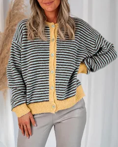 Detailed view of women's striped knit cardigan with round neck and buttons