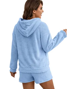 Detailed rear view of light blue fuzzy hooded sweatshirt and matching shorts loungewear set