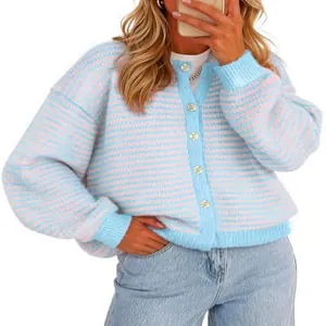 Close-up of a women's striped knit cardigan featuring light blue and pink pastel colors