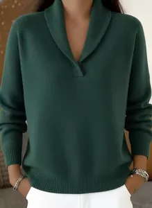 Close-up of dark green ribbed knit sweater with elegant V-neck shawl collar detail