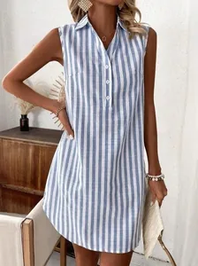Detail shot of a sleeveless V-neck casual blue and white striped shirt dress for women