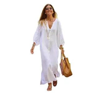 Elegante vestido largo camisero de algodón y lino blanco con manga larga para verano