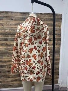 Back view of a vintage maple leaf print oversized drop-shoulder hoodie for women