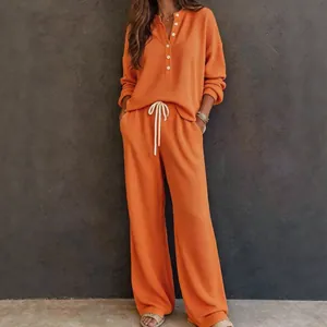 Set da relax retrò casual da donna in maglia a nido d'ape arancione con pantaloni larghi