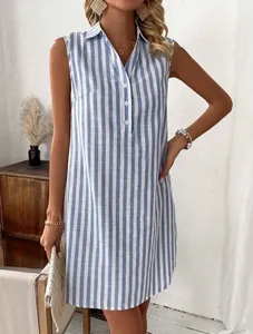 Detailed view of women's sleeveless blue and white striped shirt dress with V-neck.