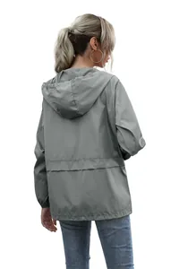 Women's lightweight gray hooded windbreaker jacket shown from the back view detail