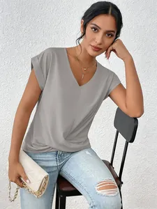 Elegant grey V-neck short sleeve T-shirt with twisted hem detail on model portrait
