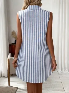 Back view of a sleeveless blue and white vertical striped casual shirt dress