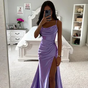 Elegant purple ruched satin maxi dress with a sexy thigh-high slit and cowl neck.