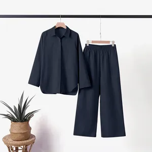 Elegant navy two-piece set featuring lapel shirt and wide-leg pants for women