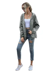 Women's lightweight grey hooded zipper jacket for outdoor hiking and rain protection.