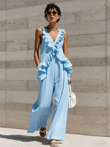 Light blue sleeveless V-neck jumpsuit with elegant ruffles, crafted from cotton linen fabric