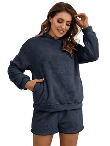 Detailed view of women's navy blue fuzzy fleece hoodie and shorts loungewear set