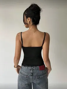 Back details of a stylish black slim-fit camisole with delicate lace trim edging.