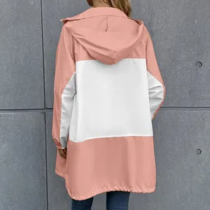 Back view of pink and white color-block hooded waterproof outdoor jacket for women