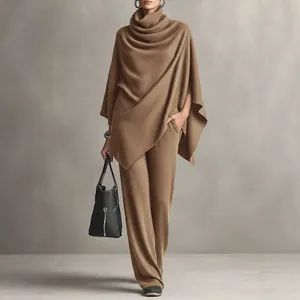 Elegant camel two-piece set featuring turtleneck poncho cape and wide-leg pants