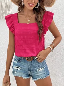 Detail view of pink square neck smocked blouse with ruffle flutter sleeves