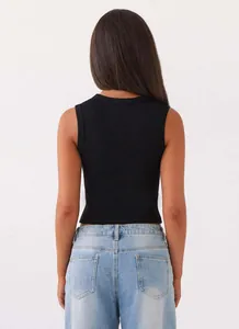 Detailed back view of a minimalist black slim fit sleeveless tank top for women