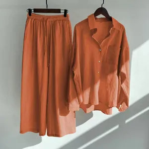 Comfortable two-piece women's cotton linen set with button-down shirt and wide-leg trousers