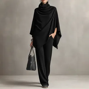 Sophisticated black cowl neck poncho cape with matching wide-leg pants two-piece set