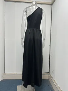 Rear view detail of an elegant black one-shoulder high-waist sleeveless maxi dress
