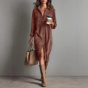 Elegant brown corduroy shirt dress with long sleeves and buttons for a chic autumn look.