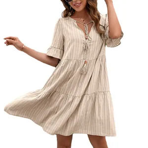 Bohemian casual loose V-neck dress with tassel details and flared sleeves in beige