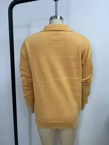 Yellow knit cardigan sweater back view showing soft fabric texture and classic collar.