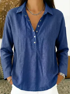 Loose fit blue long sleeve button-up shirt with lapel collar and silver buttons for women