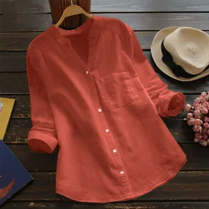 Chemise vintage en lin et coton orange brûlé, manches longues et coupe décontractée.