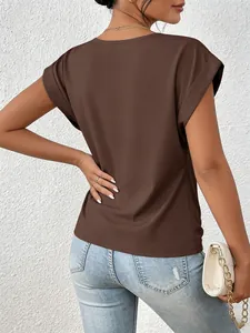 Back view of an elegant solid brown short-sleeved top with cuffed sleeves and V-neck.
