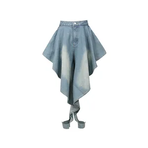 Détail du pantalon en jean vintage à taille haute avec jambe évasée irrégulière