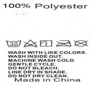 Detailed care label showing 100% polyester fabric and washing instructions for women's top