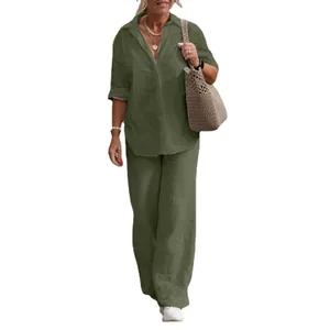 Casual olive green two-piece set featuring a button-down shirt and wide-leg trousers