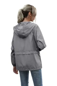 Detailed back view of a women's lightweight gray hooded rain jacket for outdoor hiking